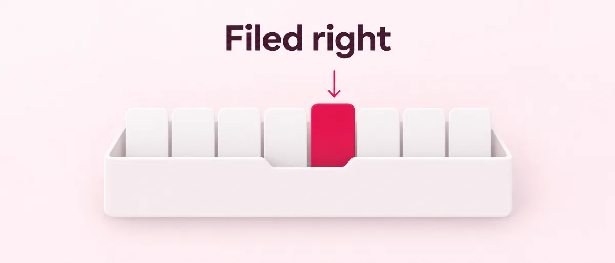 A drawer of upright cards with one pink card pulled forward, how search engines file WordPress pages